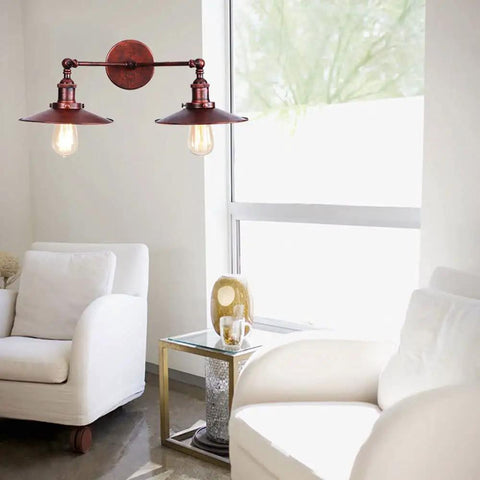Badass Industrial Vintage Dual Light Wall Sconce Featuring Adjustable Metal Arms For Instant Room Upgrades Rock Solid Construction Easy Install In Stunning Chrome Or Sleek Matte Black Finishes Today in a bright living room.