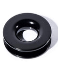 Black aluminum snatch recovery ring from 4 Pack 1/2 Inch Synthetic Soft Shackle Rope With Protective Sleeve 38,000 Lbs Capacity.