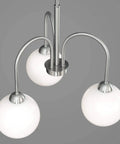 Top view of Carisa Three Light Chandelier In Brushed Nickel Finish With Glossy White Glass Globes For Modern Living And Dining Rooms Mid Century Revival Style For Home Decor