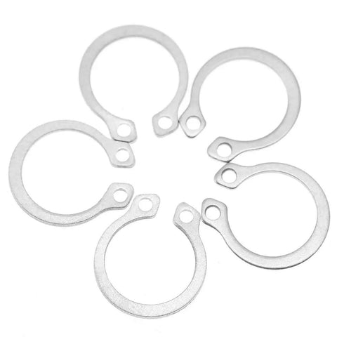 Close-up of stainless steel snap rings from Stainless Steel Retaining Ring Set 120Pc Kit Snap Ring Circlip Assortment 9Mm To 14Mm.