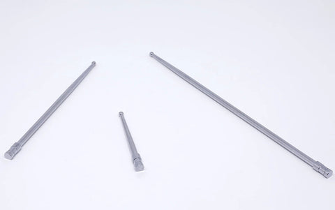 Three silver metal coaxial centering indicator rods with ball tips for milling machines