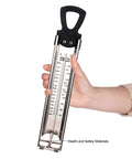 Hand holding Stainless Steel Candy And Deep Fry Thermometer With Pot Clip And Handle, Analog Sugar Thermometer