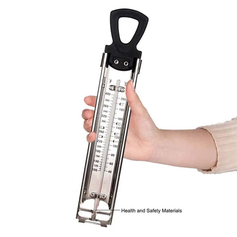 Hand holding Stainless Steel Candy And Deep Fry Thermometer With Pot Clip And Handle, Analog Sugar Thermometer