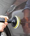Person using 6 Inch Wool Polishing Pad Kit With Backer Pad And M14 Drill Adapter For Drill Buffers on a car's surface.