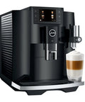 Top Shelf Heavy Duty Fully Automatic Coffee Maker With Real Bean To Cup Fresh Grind And Sleek Interface For Smooth Effortless Home Barista Brewing Action, black design, milk froth pouring.
