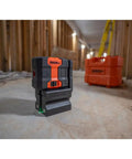 3 Dot Green Laser Level Self Leveling Kit With Magnetic Base Floor Mount And Hard Case For All Day Jobsite Use GreenBrite Technology 150 Ft Range IP64 Dust And Water Resistant Long Battery Life on concrete floor