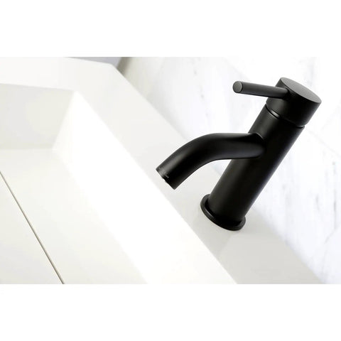 Top view of Concord Matte Black Bathroom Faucet With Solid Brass Construction, One Handle Operation, Ceramic Disc Cartridge For Sleek Leak Free Water Control And Modern Everyday Bathroom Style mounted on sink.