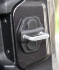 Close-up of black Door Lock Trim Decoration Covers for Jeep Wrangler JL JLU 2018 2026 and Gladiator JT 4 Door Pack of 6 installed