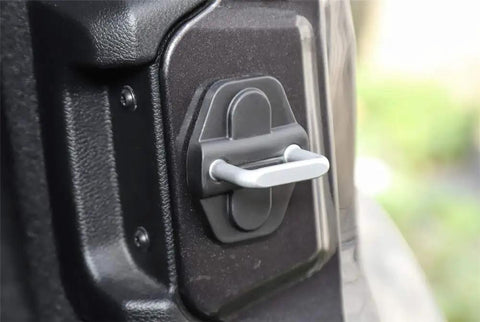 Close-up of black Door Lock Trim Decoration Covers for Jeep Wrangler JL JLU 2018 2026 and Gladiator JT 4 Door Pack of 6 installed