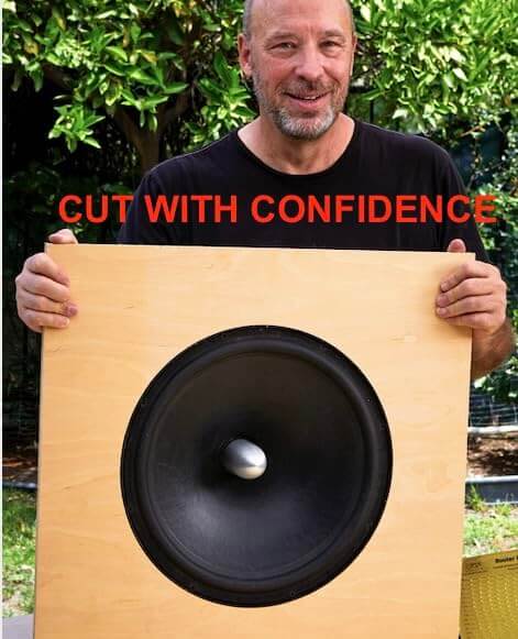 Man holding wooden panel with large speaker hole, made using Circle Cutter Router Jig For Precise Circle Cutting From 7 To 52.75 Inches Includes Centering Disc And Pivot Pins Circle Guide Kit Fits Most Popular Routers With 184 Size Options For Fast, Accurate Round Cuts