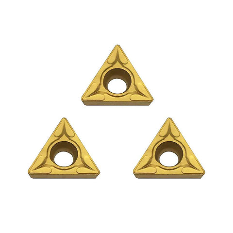 Front view of 3 gold carbide TCMT21.51 turning inserts with central mounting hole.