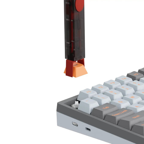 Two In One DIY Keyboard Tool With Switch Puller And Keycap Puller In Red For Easy Switch Removal And Keycap Lifting Rectangular Design With PC Housing, pulling a keycap
