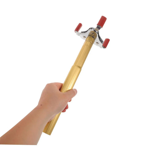 Dead Simple Fire Alarm Removal Tool With Long Extendable Pole For Quick Ceiling Smoke Sensor Detachment and Reliable Ladderless Home Safety Maintenance, held in hand.