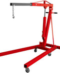 Top Shelf 2 Ton Steel Garage Engine Hoist With Folding Frame And Hydraulic Long Ram Jack, view of red crane with chain and wheels.