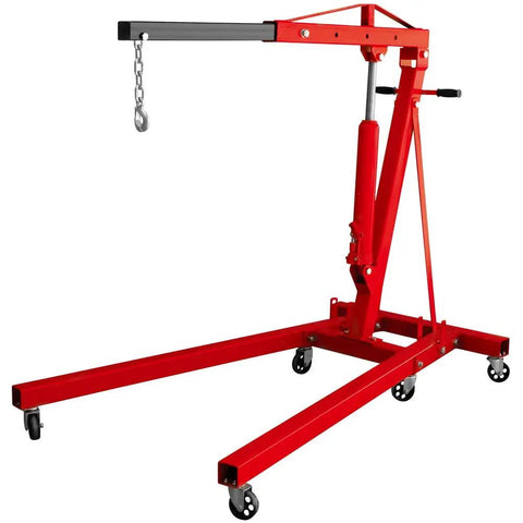 Top Shelf 2 Ton Steel Garage Engine Hoist With Folding Frame And Hydraulic Long Ram Jack, view of red crane with chain and wheels.
