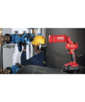 Cordless LED Flexible Head Work Light With 500 Lumens Portable Compact Lamp used by technician in workshop setup