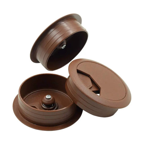 5 Pack Of Sharp Brown Desk Grommets Offering An Easy Peasy Install To Keep Office Cords Neat And Organized A No Sweat High Quality 2 Inch Plastic Cover Set showing three brown grommets with lift lids.