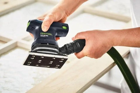Finish Orbital Sander RTS 400 REQ Plus With 250W Motor being used on wood surface with ergonomic grip and dust port