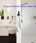 Bathroom with Matte Black Double Towel Hooks Wall Mount Heavy Duty Coat Robe Clothes Hanger For Bathroom Bedroom Kitchen Pool Garage And Hotel Use With Easy Install Hardware Included 4 Pack, holding a towel