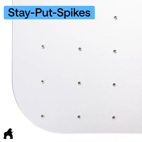 Close-up of Slip Resistant Clear Office Chair Mat For Carpet Floors With Smooth Rolling Glide showing underside spikes.
