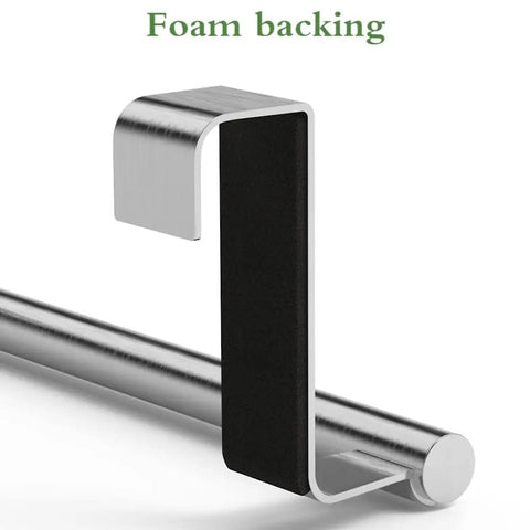 Close-up of Over Cabinet Towel Rack Set, Heavy Duty Stainless Steel Kitchen Towel Bar Holder in Chrome Finish with foam backing.