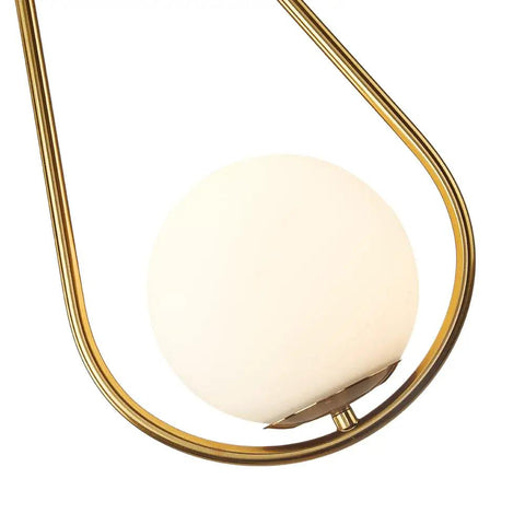 Gold Brass Modern Pendant Light For Kitchen Island With Glass Globe, close-up of brass frame and glass globe