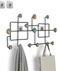 Slick Wall Mounted Coat Rack Door Hook Organizer with decorative geometric design, holds bags and towels in entryway.