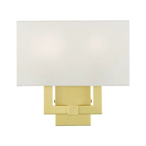 Two Light Wall Sconce In Satin Brass With Dope Off White Hardback Fabric Shade For A Clean Modern Vibe ADA Compliant Meridian Collection Contemporary Home Lighting 13 By 12.5 Inches