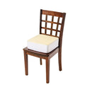 Low Rise Lift Seat Cushion With Extra Thick Firm Foam And A Cozy Sherpa Cream Cover, Elevates Your Sit For Home Office Patio And Car Seats, Easy Rise Booster Pad For Superior Support And All Day Comfort on a wooden chair