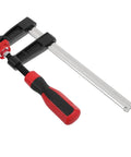 Heavy Duty F Clamp With 6 Inch Opening And Strong Clamping Pressure Perfect For Woodworking Welding Projects And Quick One Handed Operation In Your Workshop Setup, featuring a red and black handle.