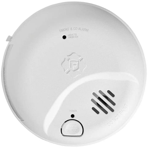Top Shelf Hardwired Smoke And Carbon Monoxide Detector Combo Built Tough With Rock Solid 10 Year Battery Backup Fully Linked Whole House Fire Safety Alarm Hassle Free 6 Pack Bundle, white ceiling-mounted smoke and CO alarm.