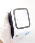 White Hands Free Desktop Barcode Scanner With Auto Sensor For Supermarkets, Retail Stores And Restaurants, held in a gloved hand.