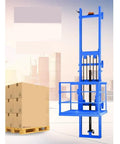 Heavy Duty Electric Lift Table And Hydraulic Platform With Remote Control for 1000kg capacity, displaying blue framework with pallet nearby.