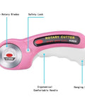Pink Rotating Cutting Tool Set With Five Extra Blades And Pens Ergonomic Handle Tools With Safety Lock And Twenty Sewing Clips For Fabrics Leather And Crafts Sewing For Do It Yourselfers, showing 45mm rotary cutter with ergonomic handle and safety lock.