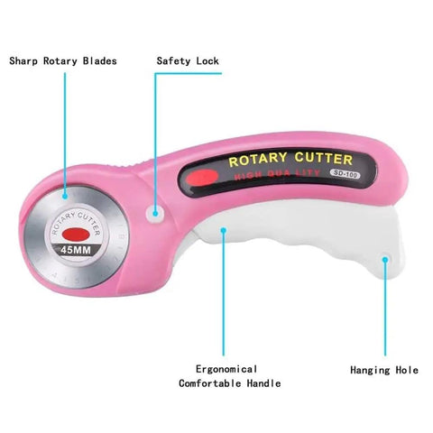 Pink Rotating Cutting Tool Set With Five Extra Blades And Pens Ergonomic Handle Tools With Safety Lock And Twenty Sewing Clips For Fabrics Leather And Crafts Sewing For Do It Yourselfers, showing 45mm rotary cutter with ergonomic handle and safety lock.
