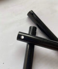 Close-up of Ten Pack Magnesium Fire Starter Rods For Camping And Survival No Fuss Ferrocerium Flint Lighters 80mm By 8mm with hole.