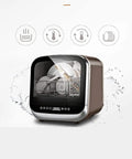 Totally Hassle Free Compact Countertop Dishwasher With Slick Stainless Steel Interior showing six place settings inside.
