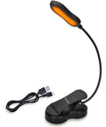 Amber Clip On Book Light With Rechargeable Battery and USB cable, flexible arm, for easy reading and travel.
