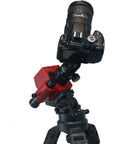 SkyTracker Pro Camera Mount With Polar Scope For Astrophotography attached to a camera on a tripod, black and red design.