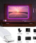 8.2ft USB TV Backlight LED Strip Lights For 32 To 58 Inch TVs, 4096 Color DIY Mood Light highlighting TV setup on wall with USB devices