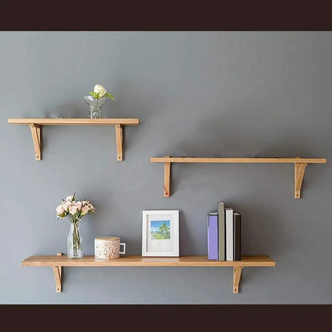 Heavy Duty L Shaped Corner Brackets For Walls Rock Solid Shelf Supports holding wooden shelves with decorative items.