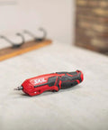 Pivot Grip 4V Rechargeable Cordless Screwdriver With 9 Bits, Bit Holder, and USB Charger on a surface