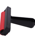 Solid Grip Rubber Paint Roller For Printmaking And Classroom Art Projects Sporting A Clean Minimalist Frame side view with red roller.