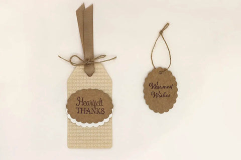 Gift tags display with 1.5 Inch Scalloped Ellipse Craft Punch Lever Action For Paper Crafting And Scrapbooking, Great For Cards And DIY Projects