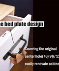 Hand holding matte black cabinet handle with 5 inch hole center on drawer, showing installation.