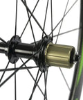 Close-up of Carbon Fiber Road Wheelset Clincher 50mm Depth With R13 Hub Decal For Zippy Aero Ride showing rear hub and spokes