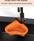 Orange triangular drain basket hanging on a faucet, part of a Four Pack Kitchen Sink Drain Basket Set, fits all sinks.