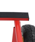 Close-up of Heavy Duty Furniture Moving Cart With Smooth Rolling Inflatable Tires And Tough Steel Frame, showing rubber foot and wheel.