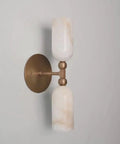 Alabaster Wall Sconce Lighting, Brass Wall Light Fixture with Natural Stone Shade in a modern hallway setting.