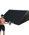Man using barbell with Ergonomic Black Curl Pad For Home Gym Space Saving Bicep Support With Adjustable Foam Comfort.